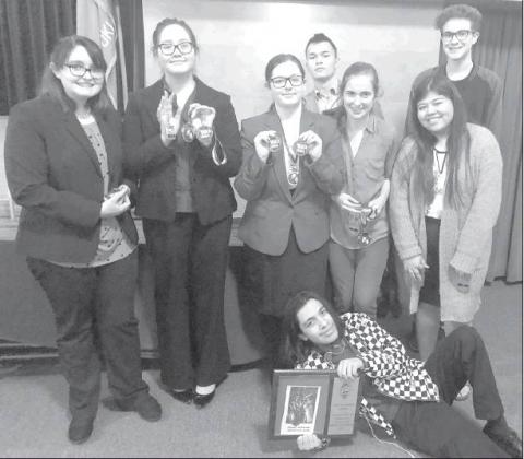 HENNESSEY HIGH SCHOOL speech team members who helped win the sweepstakes trophy in the championship division at the Okeene tournament were, standing, from left: Jaden Matthews, Milisa Heskett, Ashland Crites, Dakota Davis, Claire Ullery, Nadia Valles and Article Image Alt Text