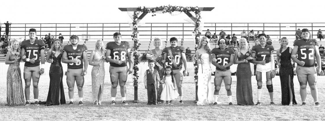 HOMECOMING ROYALTY – Hennessey’s football homecoming royalty last Friday night were, from left: sophomore attendant Jazzy Bullis and sophomore Kason Copeland, queen candidate Anna Stotts and king candidate Keigen Crites, queen candidate Mailey Scott a Smith kickoff return preserves happy homecoming evening for Hennessey