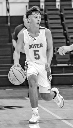 CASEN BUCK was one of the Dover Longhorns to make clutch free throws in the Skeltur Conference Tournament championship game. [Photo by Chris Simon/www. simon-sports-photos.smugmug.com]
