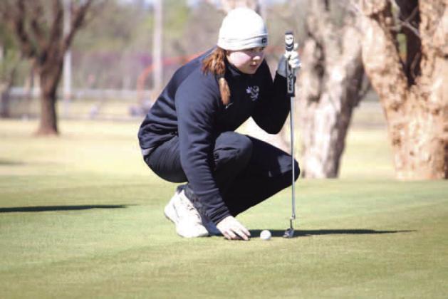 KHS girls battle tough conditions during home golf tournament 