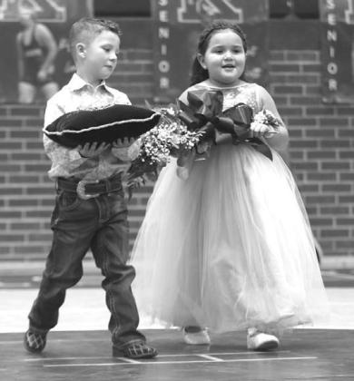 KHS SENIORS Taygen Otey and Jose Santoyo were announced as the 2025 wrestling homecoming queen and captain last Tuesday. Junior attendants are Rex Julian, the son of Trent Julian and Denise Jones, and Beatrix Jimenez, the daughter of Casio and Haeleigh Ji