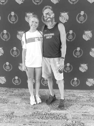 KINGFISHER RUNNER Scout Snodgrass, left, is pictured with Eric Hudgens, who coaches the Personal Best Athletics track team out of the Tulsa area. Snodgrass has been working with Hudgens this summer in her trek to the AAU Junior Olympic Games in North Caro Snodgrass sets another PR in 800 finals