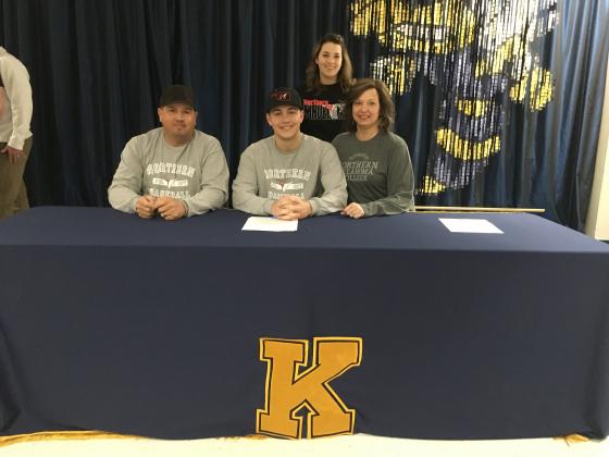 Kingfisher senior Creighton Bugg (seated center) will be playing baseball at NOC-Tonkawa next year after signing a National Letter of Intent on Wednesday. Bugg is seated with his stepfather Clint Snodgrass, mother Jennifer Snodgrass and standing is his si