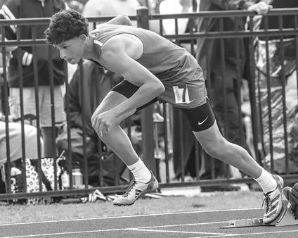 HENNESSEY HURDLER Gunnar Holder (top) was a bronze medalist in the 300 and was also a part of multiple medaling relay teams. Joining him on those teams and winning four medals overall was Camdyn Richardson, right, pictured taking off in the 400 finals. [P Hennessey boys soar to 4th at state