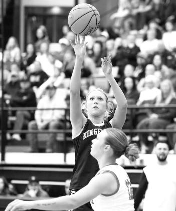 ABBIE MYERS shoots over a Keys defender in Tuesday’s semifinal win. Myers scored 21 points as the Lady Jackets advanced to the championship. [Photo by Russell Stitt/www. stitt.smugmug.com]