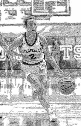 MATTIE SLEZICKEY scored 13 points Tuesday in Kingfi sher’s 66-38 victory at Woodward. It was the team’s 13th straight win. [Photo by Chris Simon/www.simon-sports-photos. smugmug.com]