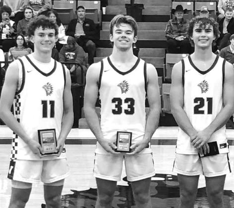 OKARCHE’S TRIO of Jett Mueggenborg (11), Easton Roby (33) and Hunter Mueggenborg (21) were named to the all-tournament team at Leedey last week. Jett Mueggenborg was named MVP. [Photo provided]
