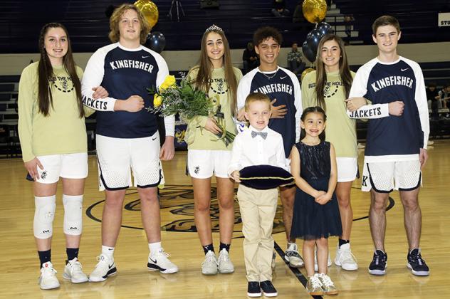 KHS SENIORS Melody Wilfong and Aryan Haro (standing center) were crowned 2020 homecoming queen and king at the APB prior to last Tuesday’s games with Elgin. Other members of the court were, from left, Jenni Beebe, Wes Hine, Jenna Mueggenborg and Harriso Article Image Alt Text
