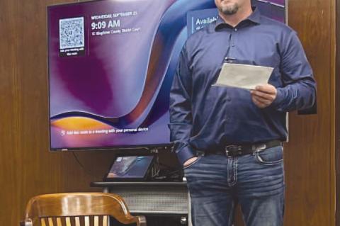 BRAD WITTROCK, KPS board member, read from a prepared message to begin the Kingfi sher County Excise Board meeting Wednesday morning. The school board had submitted a budget approximately $2 million more than was eventually approved. [KT&FP Staff Photo]