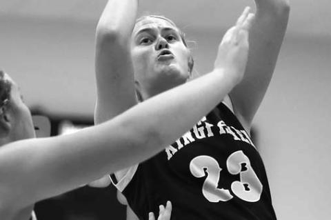 RAEGAN SNIDER attempts a shot against Alva in the semifi nals. The KHS senior earned all-tournament honors. [Photo by Russell Stitt/www.stitt.smugmug.com]