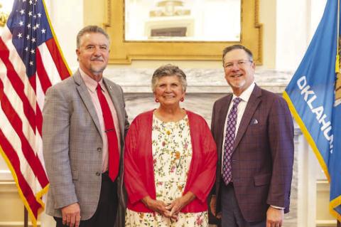 CAREER IN EDUCATION – Maribeth Boettler (center) was recognized for her 52 years of teaching by State Rep. Mike Dobrinski, R-Okeene (left), and State Senator Chuck Hall, R-Perry. A citation recognizing her work in education was read on the Senate floor 