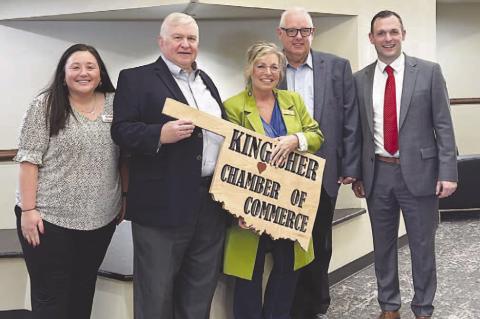 KINGFISHER CHAMBER of Commerce hosted the annual “State of the Schools” luncheon last Tuesday at Chisholm Trail Technology Center. Speakers included, from left: Brittney Crane, career development coordinator for the Oklahoma State Department of Career Technologies; Jim Thomas, Kingfi sher city manager; Shauna Rupp, Kingfi sher Chamber of Commerce executive director; Andy Evans, interim superintendent of Kingfi sher Public School; and Kurt Thomas, CTTC superintendent. Rupp is holding a sign made for the cham