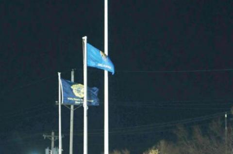 The flag waves proud... and TALLER than ever