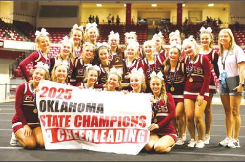 CASHION CHEERLEADERS show off their newest banner after they were announced as the Class 2A state champions last Saturday in Tulsa. Team members are seniors Jayce Bradley, Kylie Henson, Hadley House, Kyndal Isom and Azlynn Thomas; juniors Dylan Ahem, Ruby