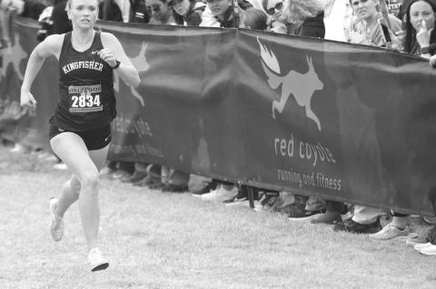 KHS JUNIOR Scout Snodgrass eyes the fi nish line of the Class 4A girls state cross country meet last Saturday. Snodgrass placed ninth individually, which earned her All- State status. The KHS girls placed sixth as a team, but were also recognized during the awards ceremony as the academic state champions. Team members accepting the honor were, from left: front row, Snodgrass, Mattie Slezickey, Terry Ann McCully, Lily Lunsford and Gisselle Ponce; middle row, Chloe Richardson, Rylee Long-Bush and Harper Evans