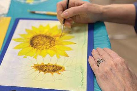 Large crowd gathers to ‘Paint for Peace’