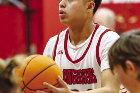DOVER SOPHOMORE Randy Vitales collapsed during a game Thursday at Mulhall-Orlando High School. After life-saving measures were administered on-site, Vitales was taken to Children’s Hospital in Oklahoma City. [Photo by Chris Simon]