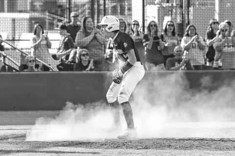 OKARCHE’S BRETT Carnott reacts after scoring a run in the top of the fi rst inning of Okarche’s Class A state quarterfi nal game against Am-Po. The Warriors scored their only two runs in that inning, but Carnott made that enough as he limited Am-Po to just one unearned run over seven innings for the victory. [Photo by Chris Simon/www.simon-sports-photos.smugmug.com]