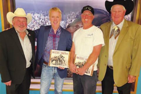 CASHION NATIVES and cousins Mark and Trey Beutler (second and third from left) attended a book signing last week for their cousins from Elk City, Randy (far left) and Bennie (far right) Beutler. The Elk City faction is nationally famous for its rodeo stoc