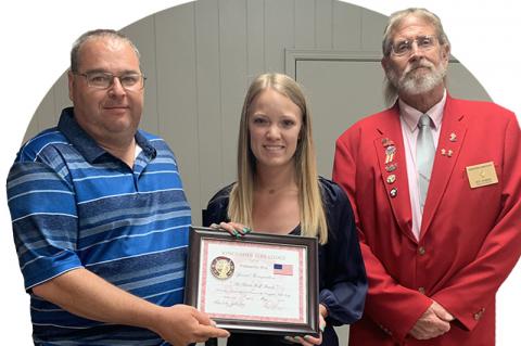Glenda Wolf family. Derrick Wolf and daughter Kelsi Edwards. Right, Roy Homier.