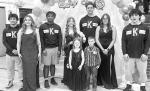 WRESTLING ROYALTY – Andrew Takape was named the KHS wrestling homecoming king and Sydnie Toepfer crowned the queen at coronation ceremonies on Tuesday at Heritage Gym. Members of the homecoming court were, from left, Brayden Kochenower, Cattie Crum, TJ 